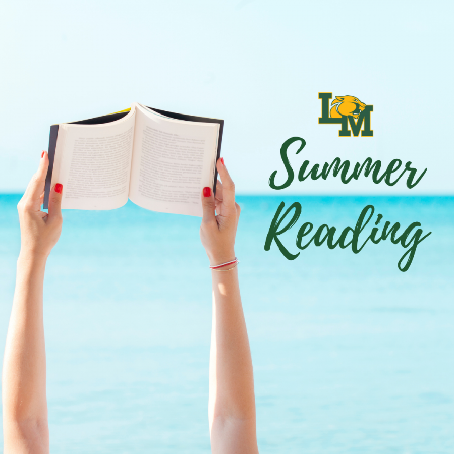 photo of two arms holding a book at the beach